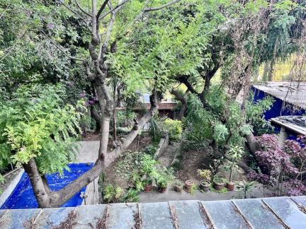 alberca y jardin vista desde arr